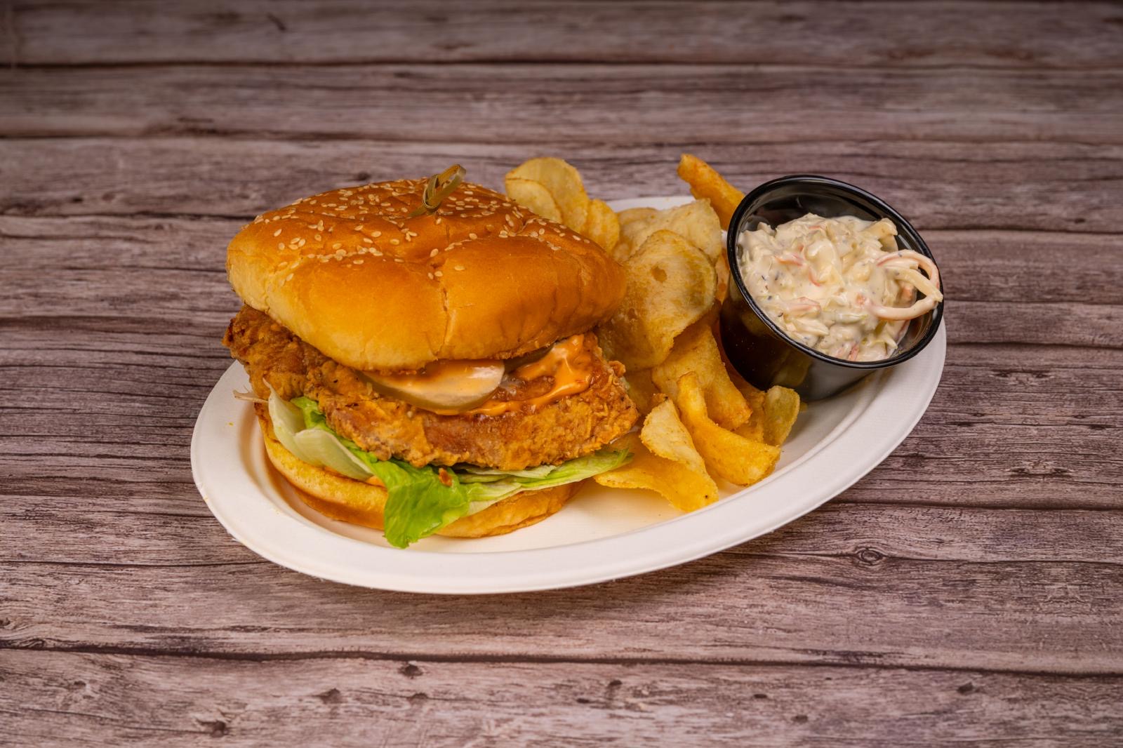 Crispy chicken burger with slaw and kettle chips