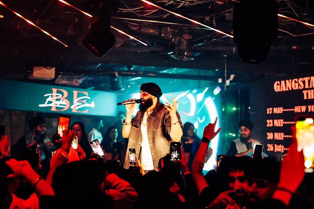 Artist on stage in DC with Gangstas Paradise tour dates behind